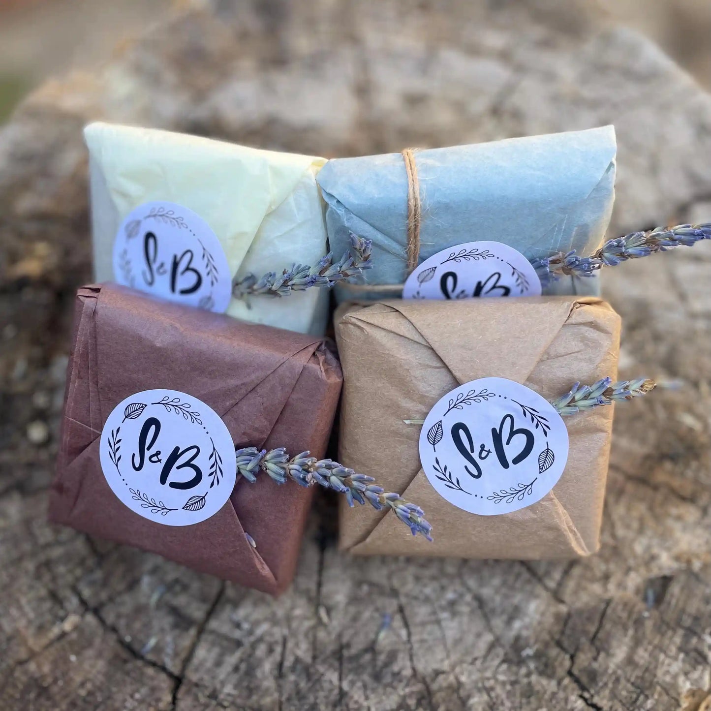 Four beautifully gift-wrapped handmade soap bars from Soapy & Bubbly, ready to be sent as an eco-friendly gift.