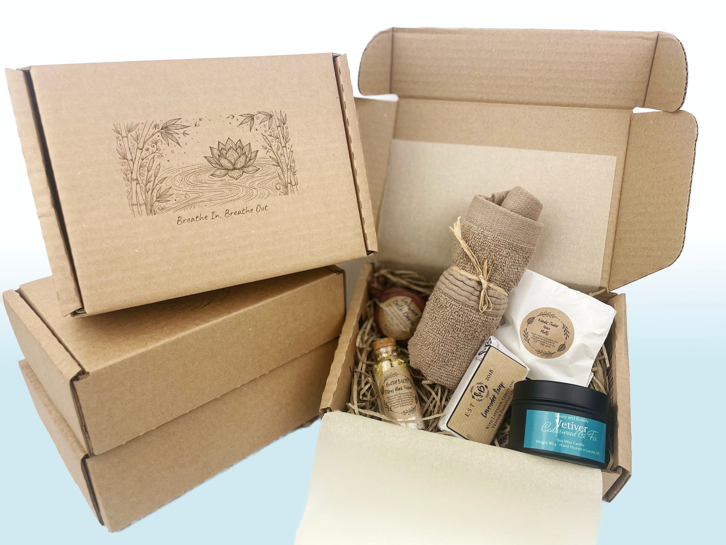 Breathe in breathe out mindfulness gift box with lotus flower design near the box with self-care products