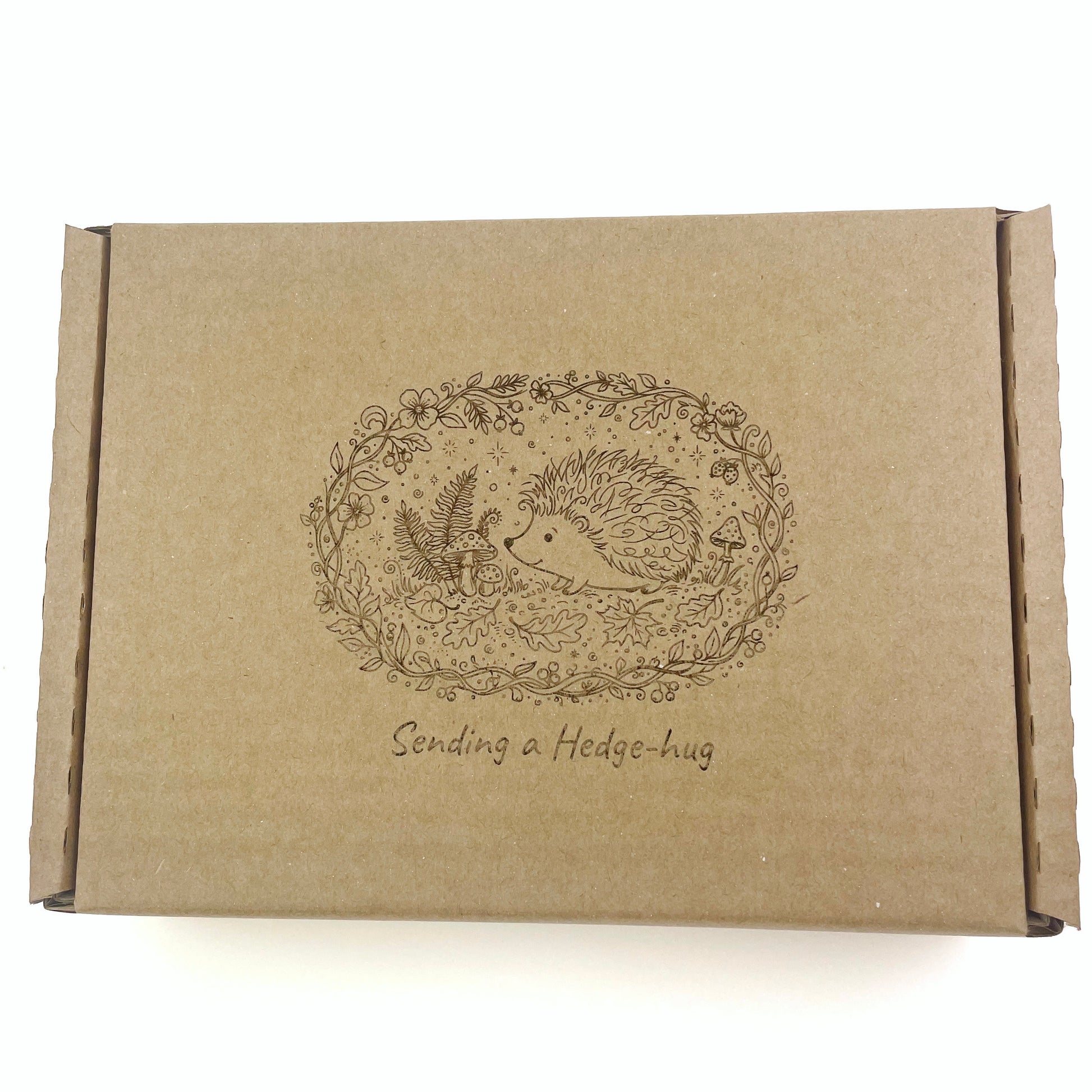 Laser etched gift box with cute hedgehog illustration sending a hedge-hug