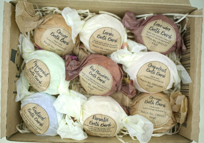 Set of 9 luxury bath bombs with natural ingredients and essential oils.